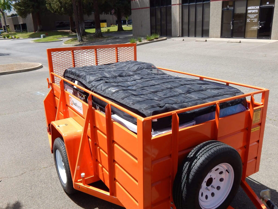 Utility cargo net used for keeping boxes safe and secure on the road. 