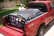 Short truck bed cargo net in use. Moving and hauling products. 